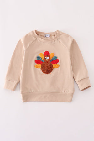 Beige turkey french knot top