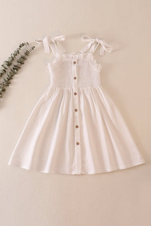 White linen smocked button dress