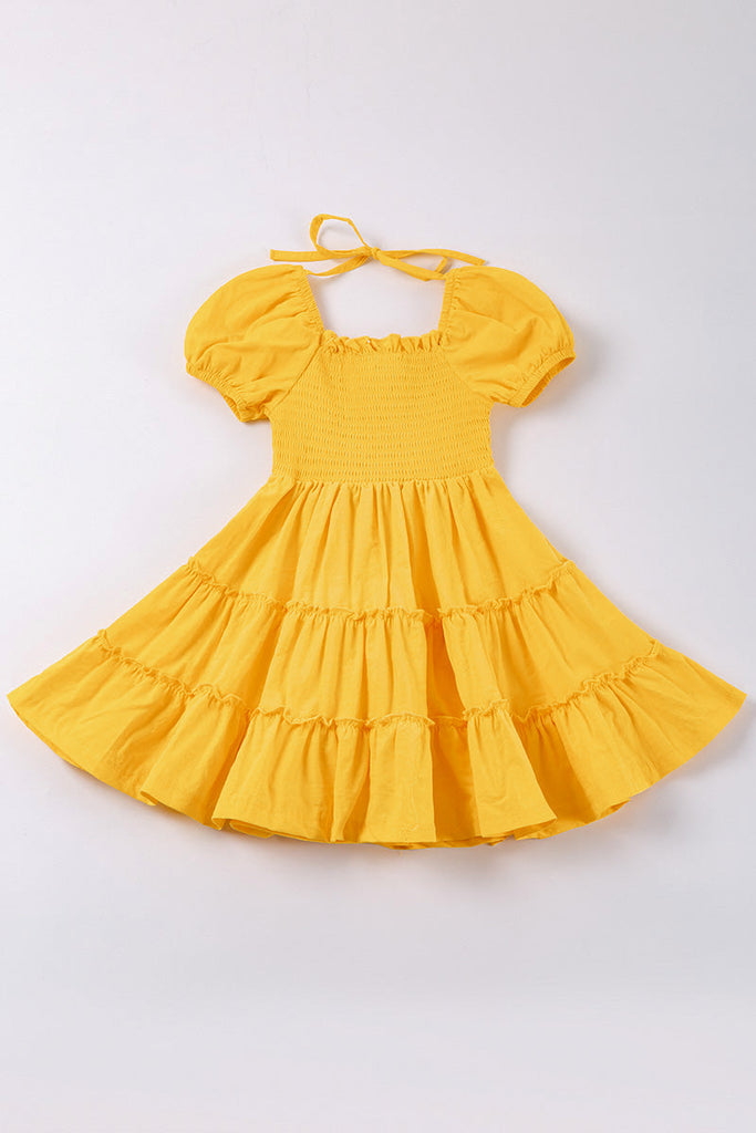 Yellow smocked ruffle tiered dress