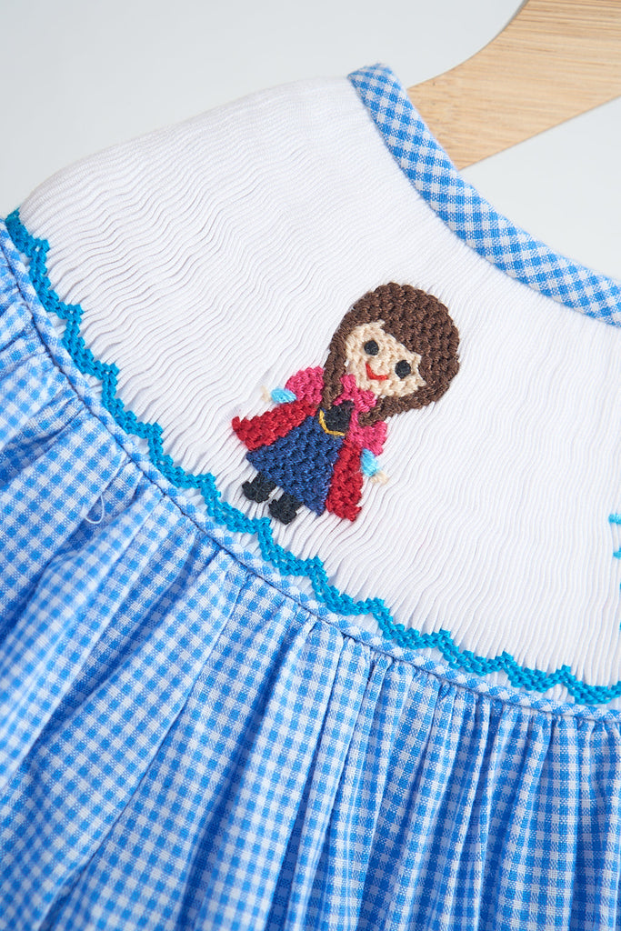 Blue snow princess hand smocked gingham dress – HoneyBean Blue snow princess hand smocked gingham dress – HoneyBean