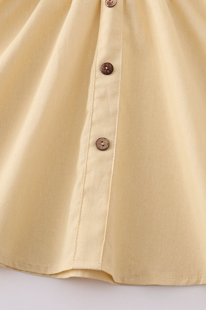 Cream smocked strap button dress